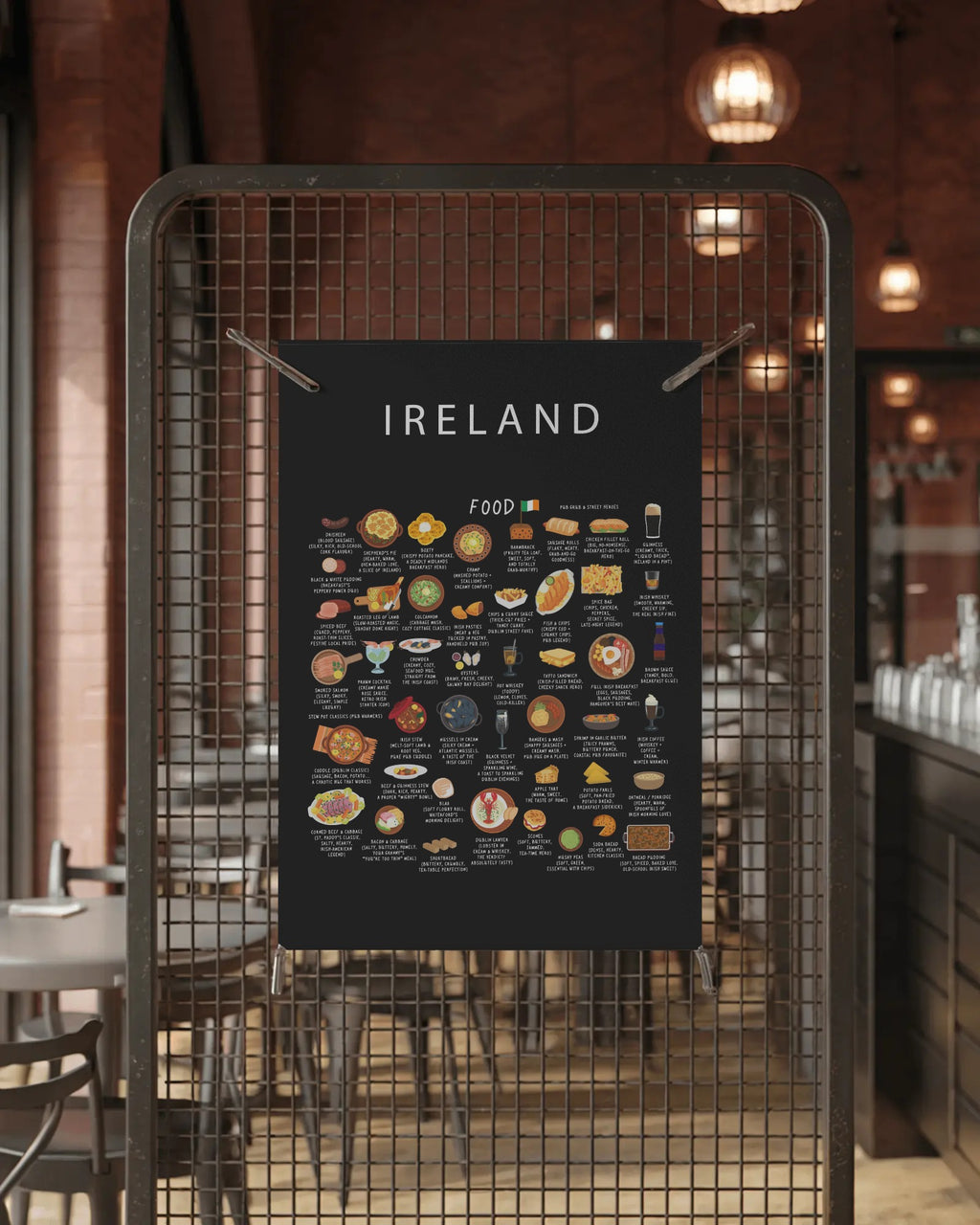 A black Ireland food poster clipped to a metal wire mesh screen inside a warm, dimly lit restaurant interior.